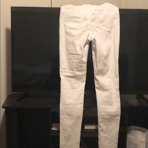 Unworn white cut up jeans from fashion nova. - Picture 2 of 5